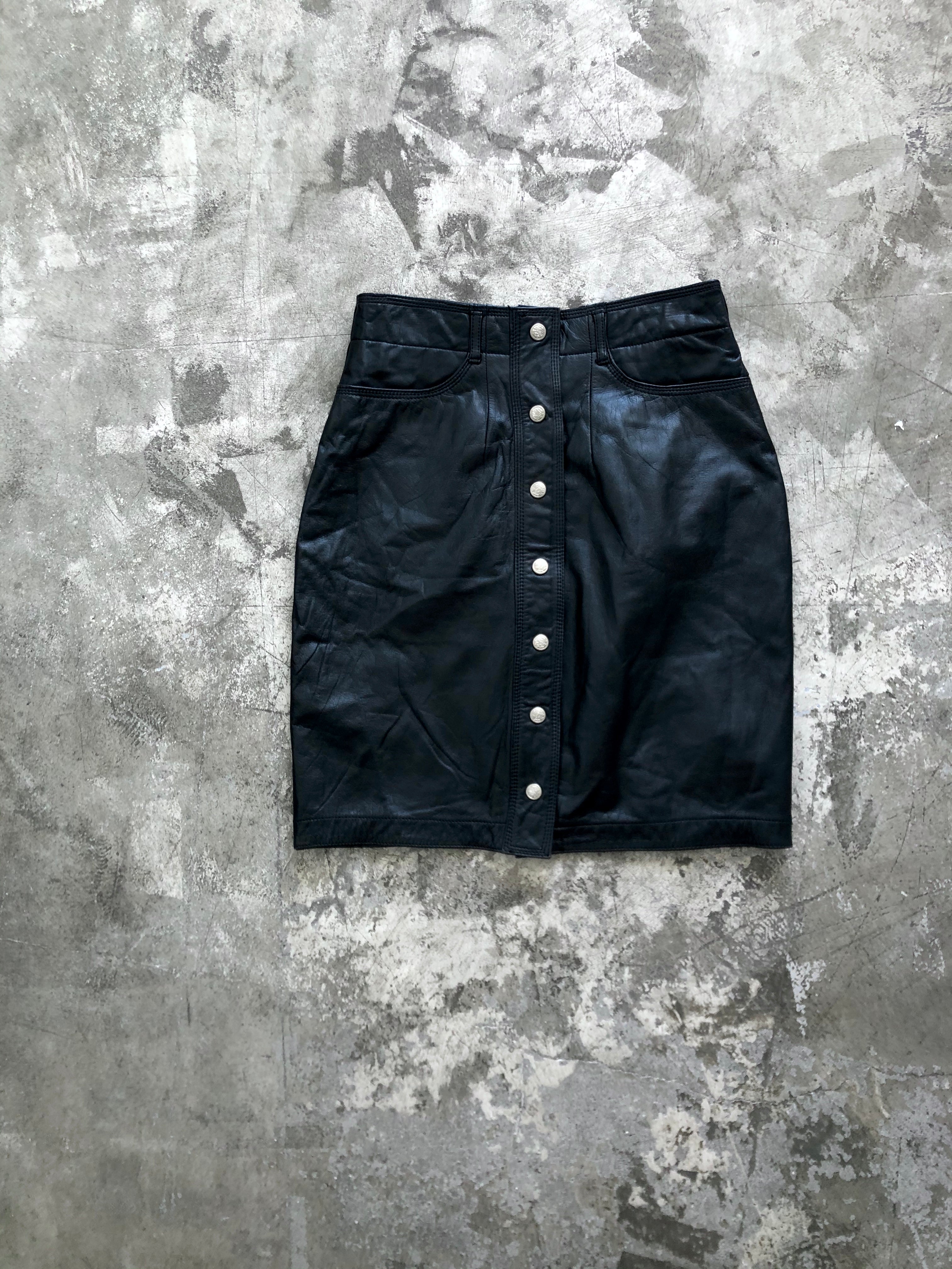 black leather skirt with snap fastener