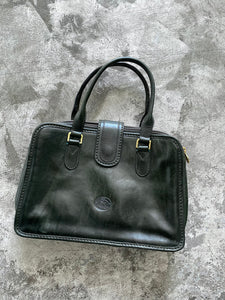 dark green leather bag