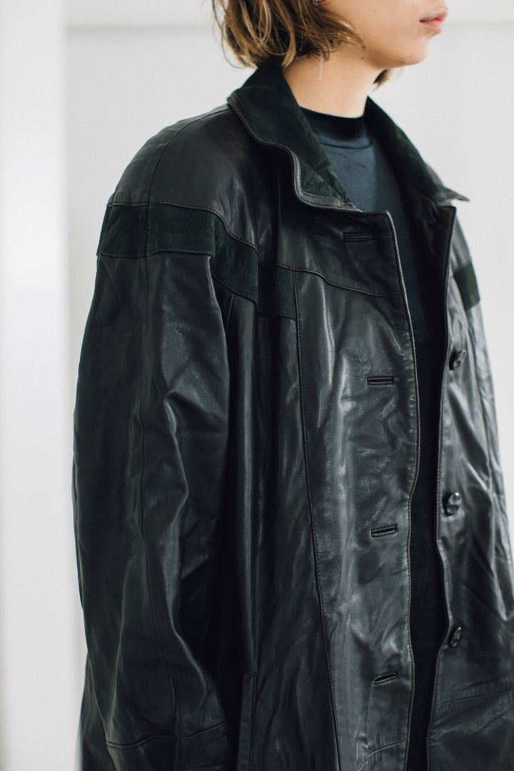 black genuine leather coat with green line